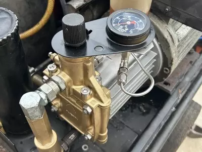 Fully reconditioned high-pressure pump fitted on a restored Kew 1502V hot pressure washer.